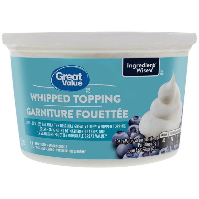 Great Value Light Whipped Topping in a white plastic tub with a blue label featuring the Great Value logo and Ingredient Wise symbol. The label states 30% less fat than the original and shows a swirl of whipped topping with blueberries. This light dairy topping is kept frozen and thawed in the fridge before serving, ideal as a frozen dessert garnish.