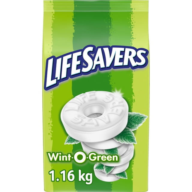 Lifesavers Wint-O-Green Mints 1.16 kg bag showing stacked white hard-candy mints embossed with 'LIFE SAVERS' text and fresh green mint leaves on a green striped background, suitable for freshening breath after meals or sharing at work