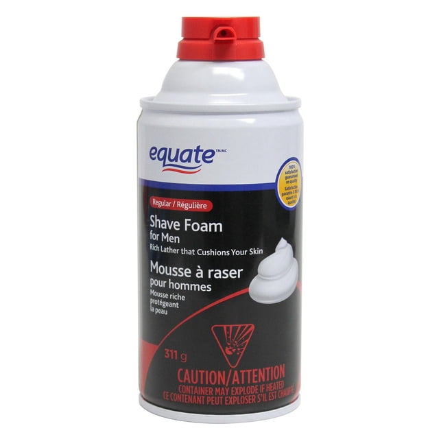 Equate Mousse à Raser Régulière pour Hommes 311 g, Bombe Aérosol avec Corps Blanc, Étiquette Noire et Embout de Pulvérisation Rouge, avec Texte Bilingue Décrivant une Mousse Riche Qui Coussin la Peau, un Graphique Tourbillon de Mousse Blanc, et un Avertissement de Prudence sur le Risque d'Explosion s'Il Est Chauffé.