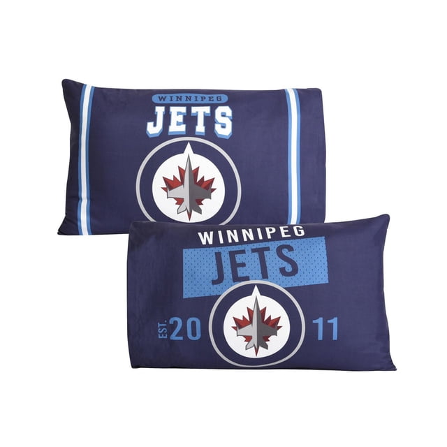 NHL Winnipeg Jets 2-Pack Pillowcases, 20" x 30", featuring reversible navy blue designs with the official Jets logo and 'Winnipeg Jets' text in white and light blue. Made from soft polyester microfiber, these standard pillowcases provide comfort and team spirit, suitable for bedrooms or game rooms.