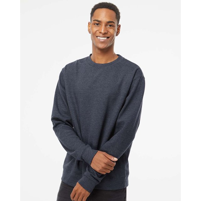 Independent Trading Co. - Midweight Crewneck Sweatshirt in a dark heathered colour, made from an 80/20 cotton/polyester blend fleece with 100% cotton 20 singles face yarn. Features a tear-away label and a classic crewneck design. The model is wearing the sweatshirt in a casual pose against a plain white background.