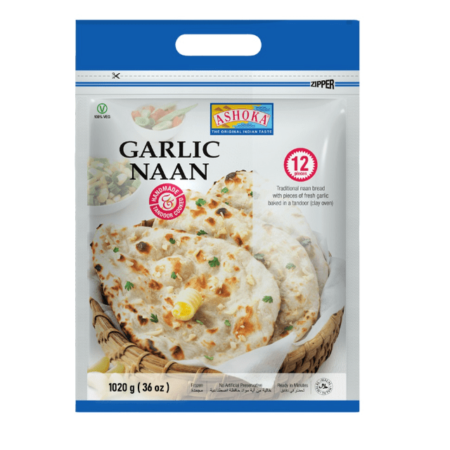 TANDOORI NAAN - GARLIC (8 X 1020 GMS (12PCS) BAGS) featuring Ashoka brand frozen garlic naan bread in a resealable blue and white bag with handle, showing three pieces of tandoori-baked naan topped with garlic and herbs in a woven basket, weighing 1020 grams (36 oz), suitable for quick oven preparation and traditional Indian meals.