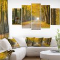 thumbnail image 1 of Designart 4 Piece Country Road Below Yellow Trees Landscape Photo Canvas Print, 48" x 28", Yellow, 1 of 3