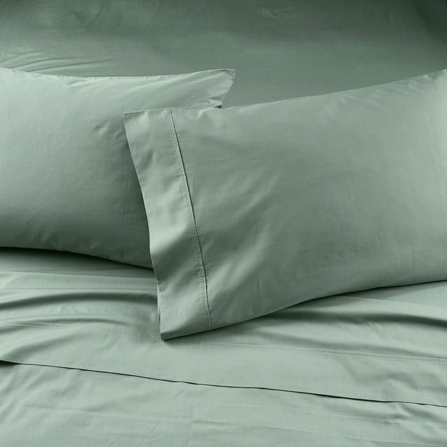 Better Homes & Gardens 300 Thread Count Cool & Crisp 4-Piece Cotton Percale Sheet Set in a solid muted green shade, featuring two pillowcases, a fitted sheet, and a flat sheet made from breathable, lightweight 100% cotton percale fabric with a crisp texture ideal for all-season comfort.