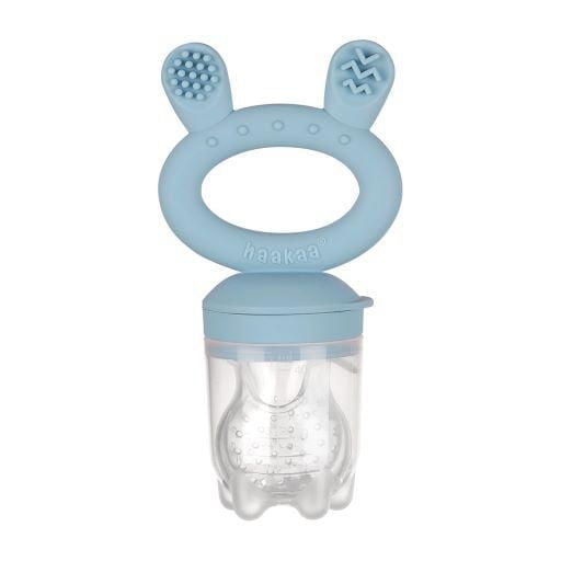 haakaa Fresh Food Feeder & Cover Set in sky blue with a soft silicone ring handle featuring textured teething ears and a clear silicone pouch with small holes for safe baby feeding, encouraging self-feeding and fine motor skill development.