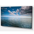 thumbnail image 2 of Ciel Bleu Nuageux au-Dessus de la Surface Marine, 2 of 3