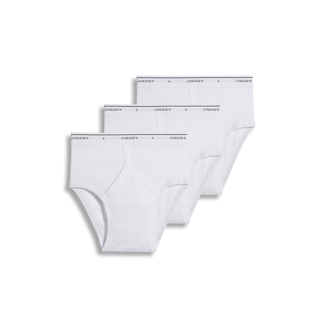 Jockey Men's Classic Low Rise Brief - 3 Pack featuring a Y-Front fly design for a secure fit. Made from breathable 100% cotton with Staycool+ technology to wick sweat and StayNew technology to reduce pilling and fading. Includes three white low-rise briefs with full coverage and an elastic waistband displaying the Jockey logo.
