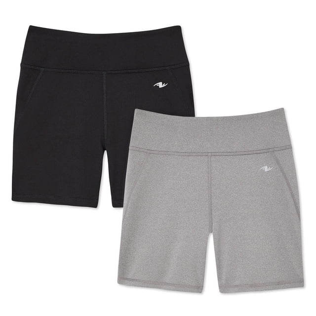 Athletic Works Girls' Compression Short 2-Pack includes one black and one grey short with wide elastic waistbands, flatlock stitching, and a small white logo on the left thigh, made from 80% polyester and 20% spandex interlock knit with DRI-MORE moisture-wicking fabric, suitable for girls' activewear bottoms and training.