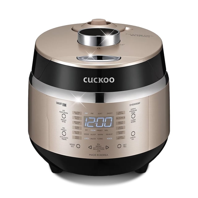 Cuckoo EHSS0309FG Electric Induction Heating Pressure Rice Cooker in gold, featuring a compact 3-cup capacity and a sleek design with LED touch controls. The cooker includes a stainless steel inner pot with X-Wall nonstick coating for even heat distribution and durability. It offers 15 menu options, including GABA rice, brown rice, and multi-cook, along with smart features like a preset timer, reheat option, and keep-warm function. The top panel displays a digital clock and menu selection buttons, with a detachable inner lid for easy cleaning. Accessories include a rice spatula, measuring cup, and product manual. Dimensions: 8.6 inches tall, 8.2 inches wide, and 12.6 inches deep.