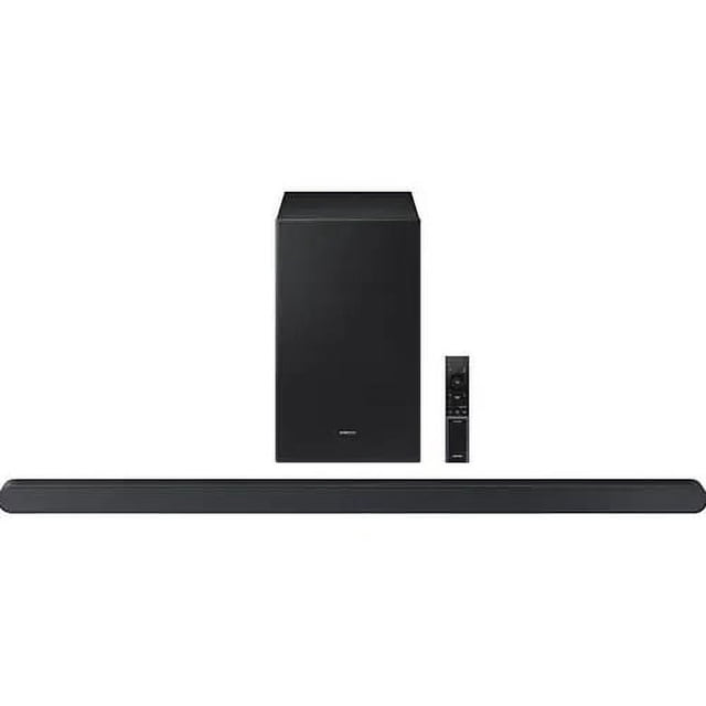 Samsung S series 3.1ch Ultra Slim Soundbar (HWS700D) with an ultra slim black soundbar, wireless black subwoofer, and compact remote control, designed for wall-mounted TVs and featuring wireless Dolby Atmos, Q-Symphony, and SpaceFit Sound Pro for optimized surround sound.