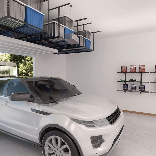 3 x 6ft Overhead Garage Storage Rack, 22'' to 40'' Adjustable Heavy Duty Metal Ceiling Storage Racks with a 450 lbs weight capacity, shown installed in a garage. The black metal rack measures 72 inches long, 36 inches wide, and 40 inches high, providing ample overhead storage for bins, boxes, and other items. The image depicts a clean garage with a white car parked below the racks, showcasing the efficient use of ceiling space.