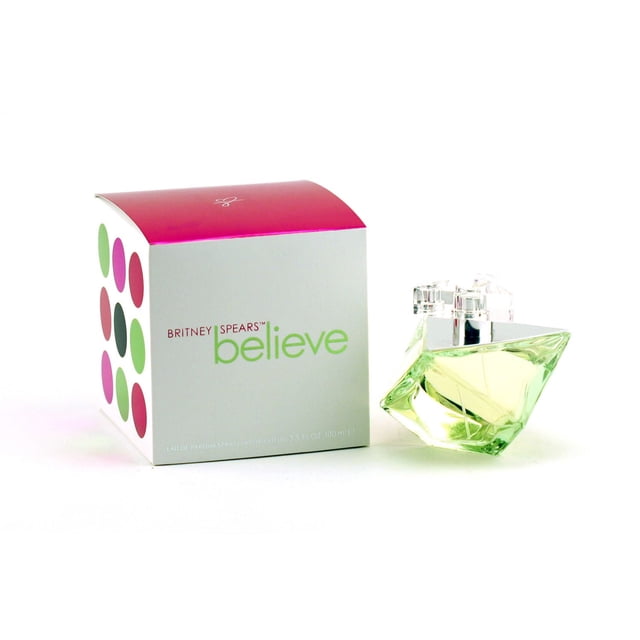 Believe by Britney Spears eau de parfum spray in a 100 ml faceted glass bottle with light green fragrance, displayed next to its white box with pink top and colorful circular patterns, representing a youthful, fruity floral scent suitable for playful wear.