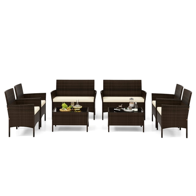 Patiojoy 8 Piece Patio Rattan Conversation Set with mix brown PE rattan and beige cushions. Includes 2 loveseats, 4 chairs, and 2 tempered glass coffee tables. Features ergonomic armrests, high backrests, and a sturdy metal frame for durability. Perfect for outdoor spaces like patios, backyards, or poolside areas. Often used for casual gatherings or relaxing evenings.