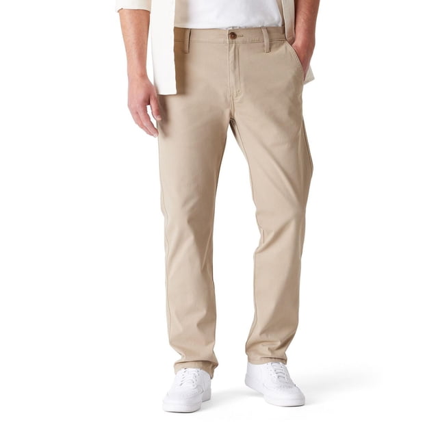 Levi Strauss Signature™ Men's Essential Straight Chinos in beige, front view on a male model wearing white sneakers and a white shirt, featuring a straight fit with slant front pockets, zip fly, and buttoned welt back pockets, made from stretch twill fabric for comfort and flexibility, often used for casual or business casual occasions.