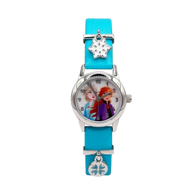Frozen Girls Analog Watch with hanging charm featuring a silver metal case and blue adjustable strap. The dial displays Frozen characters with clear black numerals and silver hands. The strap includes two silver hanging charms, one shaped like a snowflake. Quartz movement with battery included, suitable for children aged 6 and up. Also suitable as a collectible accessory for Frozen fans.