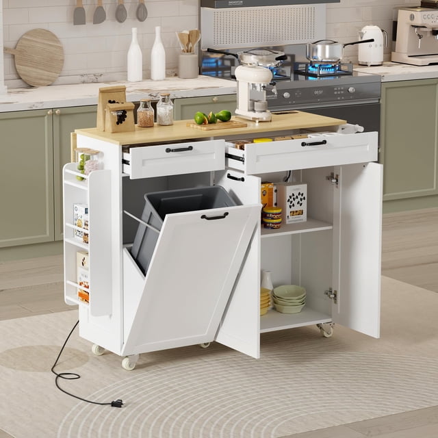 Rolling Kitchen Island with Drop Leaf by CuisinSmart in white, featuring a spacious 45.3-inch countertop, two large storage cabinets, two drawers, and a foldable drop-leaf for extra workspace. Includes a trash storage cabinet, spice rack, towel rack, knife holder, and a power outlet with 2 USB ports and 2 three-prong sockets. Equipped with five metal casters with brakes for stability. Shown in a modern kitchen setting with utensils, appliances, and decor.