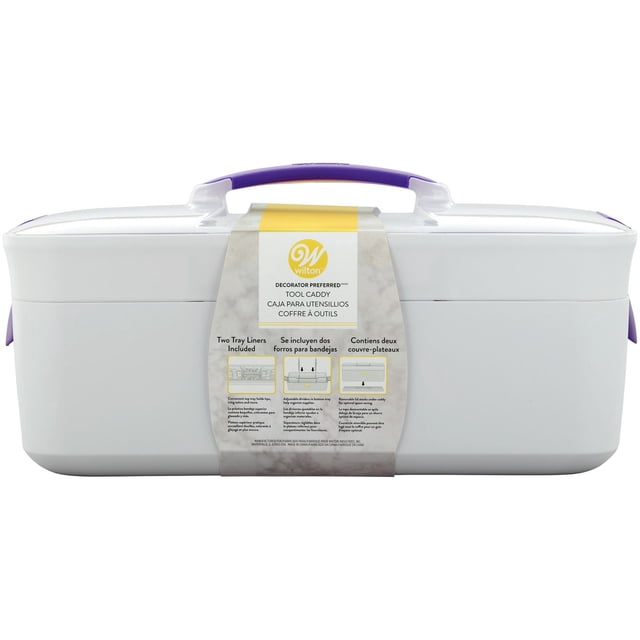 Wilton Decorator Preferred® Caddy de Décoration en Blanc avec Poignée Violette, Forme Rectangulaire avec Couvercle Amovible Empilable en Dessous. Comprend un Plateau Supérieur pour Décorer des Pointes et des Couleurs de Glaçage, Grand Compartiment Inférieur avec Séparateurs Ajustables pour Organiser les Outils de Décoration et les Fournitures d'Art. Verrous à Pression Contenu Sécurisé pendant le transport. Facile à Nettoyer avec un Chiffon Humide.