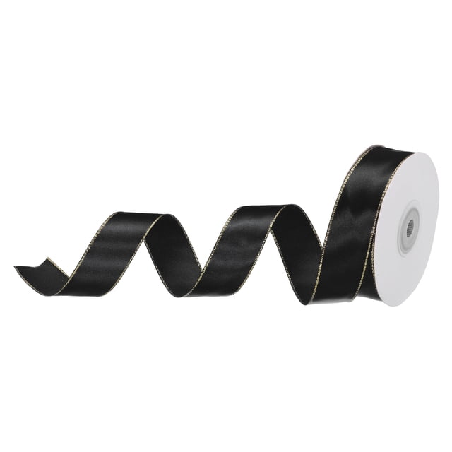 Unique Bargains 1 Inch 25 Yard Wide Satin Ribbon with Gold Edges Grosgrain Fabric Ribbon for Gift Wrapping, Black. This ribbon features a glossy black satin finish with gold-edged accents, measuring 1 inch wide and 25 yards long. Suitable for gift wrapping, floral arrangements, wedding decor, and DIY crafts. The image shows the ribbon partially unrolled, highlighting its smooth texture and elegant design.