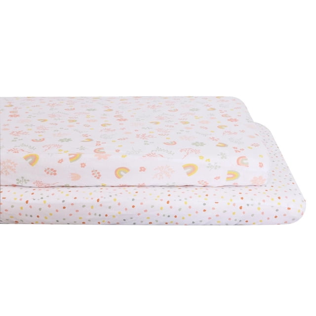 George Baby 2-Pack Jersey Mini Crib Sheets made of soft 100% cotton, including one sheet with pastel rainbows and floral designs and another with multicolored polka dots, sized to fit standard mini crib mattresses for nursery bedding.