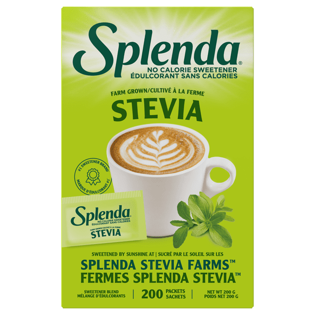 Splenda Stevia Boîte de 200 Sachets avec Fond Vert Vif Présentant une Tasse de Café Blanche avec art Latté, un Seul Sachet d'Édulcorant à la Stévia et des Feuilles de Stévia Fraîches, Mettant en Valeur un Substitut de Sucre Naturel, Sans Calories, des Fermes Splenda Stevia, Contenant 200 Sachets.