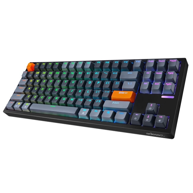 Adesso EasyTouch 1100 wired/wireless/Bluetooth multi-OS illuminated VIA mechanical compact keyboard with tactile red switches, RGB backlighting, and hot-swappable keys, shown at a 3/4 angle with orange Enter and Escape keys and black frame, ideal for Windows, macOS, and Linux users.