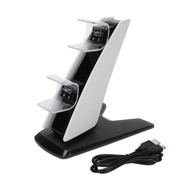 Station de Recharge pour Manettes, Station de Recharge Double Conçue pour les Manettes de console de Jeu PS5, Présentée en Matériau ABS Blanc Élégant avec une base Noire. la Station Présente Deux Emplacements de Recharge avec Prise en Charge Transparente et Comprend un Câble de Recharge USB. Elle Prend en Charge la Recharge Rapide de Deux Manettes Simultanément et Dispose d'Une protection de circuit Intégrée pour Assurer une Charge Sûre et stable. l'Ensemble Comprend Aussi un Support de base et un Manuel.