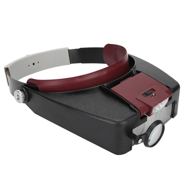Loupe à Montage sur la Tête par Zaqw en Rouge et Gris, Présentant un design Ergonomique avec Serre-Tête Ajustable et Interrupteur Coulissant. Fabriquée en ABS et Lentille Optique en Acrylique, Elle Offre des Grossissements de 1,5x, 3X, 8,5x et 10X. Comprend Deux Lumières DEL avec direction Réglable pour une Haute Luminosité. Convient à la Lecture, à la Réparation de l'Électronique et aux Tâches Détaillées comme la Greffe de Cils. les Dimensions Sont d'Environ 250 x 200 x 50 mm