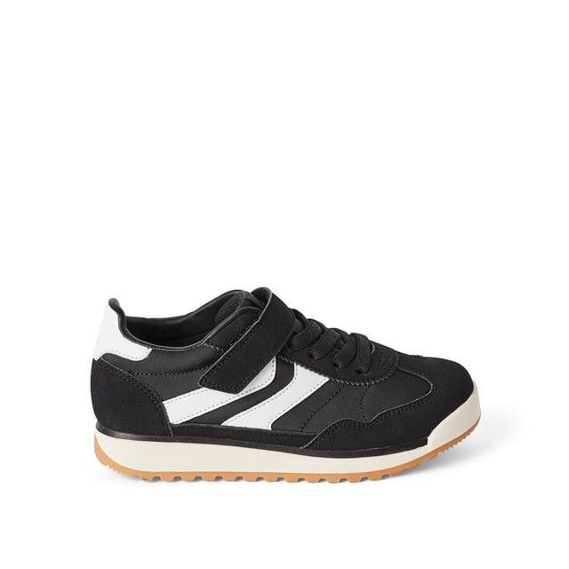 George Boys' Sneakers in side profile with black and white colour blocking, faux leather and polyester upper, wide width, round toe, lace-up and hook and loop strap closures, and rubber outsole with gum tread, ideal for casual or sporty looks.
