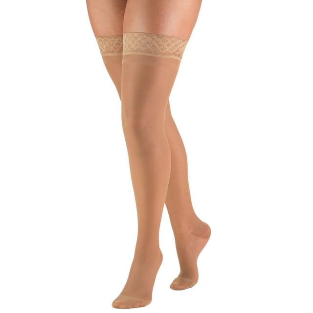 Truform Bas de Compression Transparents, 15-20 mmHg, Longueur Cuisse pour Femmes, 20 Deniers, Beige, Très Grand. Bas Transparents Cuisse avec Bande Supérieure Bordée de Dentelle et Doublure de Prise en silicone pour Ajustement Sécuritaire. Offre une Thérapie de Compression Graduée pour Améliorer la circulation et Soulager les Jambes Fatiguées, l'Enflure Mineure, les Varices et les Veines Araignées. Fabriqué à Partir de nylon et spandex Durables, Idéal pour une Assise Prolongée, la Station Debout, les Voyages Ou la Récupération Postchir