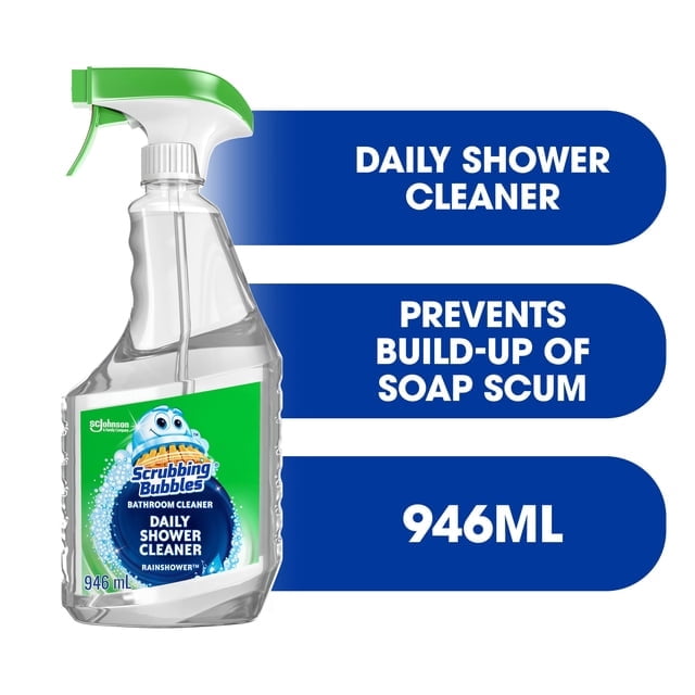 Scrubbing Bubbles® Daily Shower Cleaner in a 946mL spray bottle with a green nozzle, designed to prevent soap scum, limescale, and grime on tubs, shower walls, and doors. Features a wide spray for easy application and a fresh Rainshower scent.