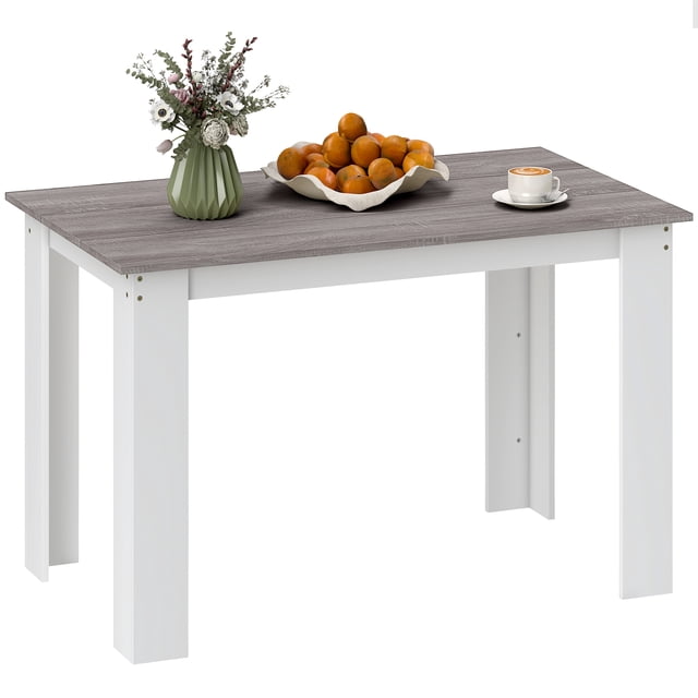 HOMCOM Table à Manger Moderne de 47 Pouces pour 4 à 6 Personnes avec Effet Bois, Gris. Cette Table à Manger Rectangulaire Présente une surface Élégante à grain de Bois avec Revêtement en Mélamine en Gris avec une Légère Résistance à l'Eau, Soutenue par des Pieds Triangulaires Blancs Robustes. design Compact, Elle s'Adapte aux Petits Espaces Tout en Pouvant Accueillir jusqu'à six Personnes, la Rendant Idéale pour les Repas en Famille, les Soirées de Jeux Ou les Rassemblements. Dimensions : 47.2 Pouces L x 27.2 Pouces L x 29.5 Pouces H (12