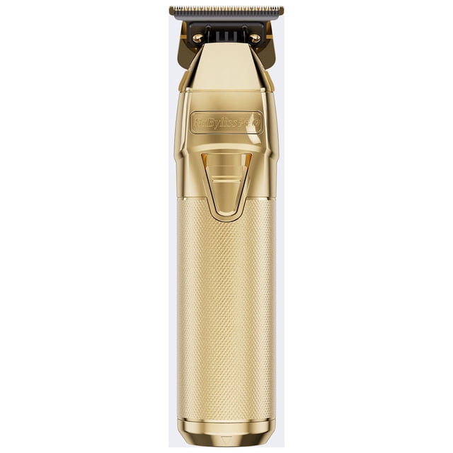 Babyliss Pro Trimmer Gold FXONE featuring a sleek gold all-metal housing with ergonomic design and a textured grip. Equipped with a gold ultra-thin DLC/titanium standard-tooth T-blade for precision grooming, a powerful N1 brushless motor operating at 7,200 RPM, and an interchangeable lithium-ion battery pack offering up to 3 hours of runtime. Includes a 4-stage LED ring battery indicator and a quick-release button for convenience. Ideal for professional-grade grooming.