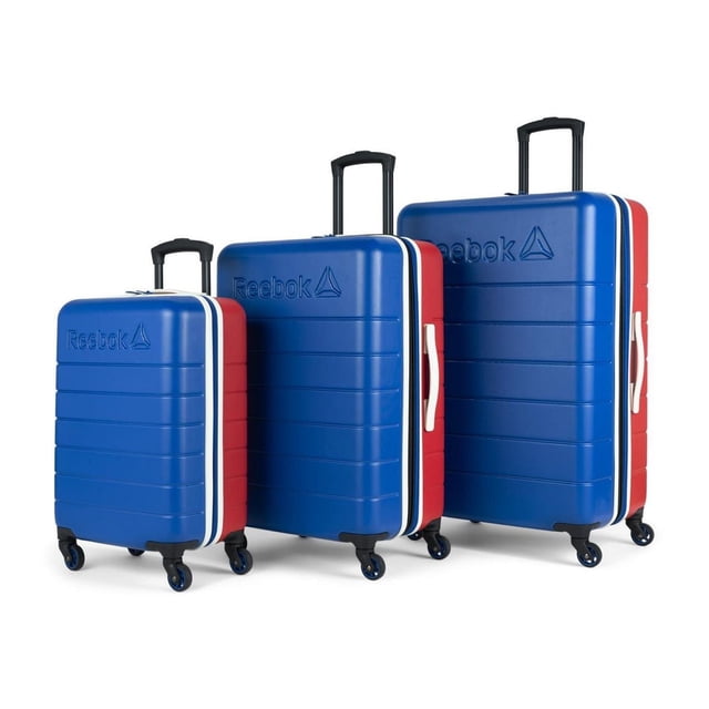 Reebok- Double Dribble Collection - Ensemble de 3 Pcs de Valises Rigides Emboîtables en Bleu avec Côtés Rouges et Garniture Blanche, avec Poignées Télescopiques Ergonomiques, Roues Pivotantes à 360 Degrés pour un Roulement Fluide, logo Reebok Embossé et Organisation Interne avec Système d'Extension, Illustré sur Fond Blanc.