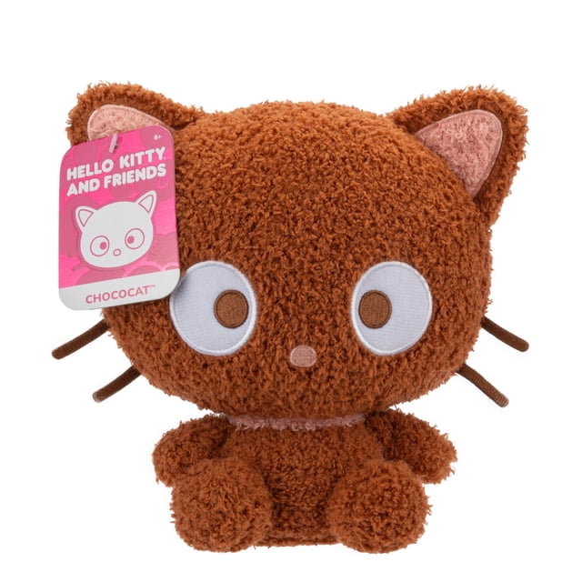 Hello Kitty & Friends 8" Plush (Soft Velveteen) - Chococat showing a front-facing brown plush toy with curly velveteen texture, large embroidered white and brown eyes, a small chocolate-colored nose, pink inner ears, and six brown whiskers, sitting upright with a pink collar and a pink Hello Kitty & Friends tag on its left ear, suitable as a collectible stuffed animal or soft plush toy for display or play.