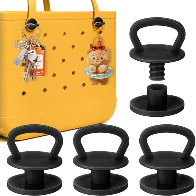 4Pcs reusable replacement buttons for Bogg Bag strap, crafted from durable black resin plastic with a built-in hook for hanging accessories. Displayed alongside a yellow Bogg Bag featuring attached items like keys and a teddy bear pendant. Ideal for crafting and apparel projects, these buttons offer a twist-lock mechanism for easy reuse and compatibility with Bogg Bag handles.