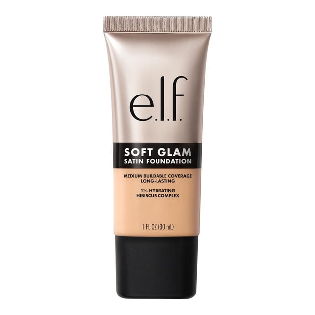 e.l.f. Cosmetics Soft Glam Satin Foundation in a 30 ml beige liquid foundation tube with black cap, offering medium buildable coverage and a breathable, long-lasting satin finish. Infused with 1% hydrating hibiscus complex and fruit extracts, it is non-comedogenic and suitable for dry, oily, and combination skin.