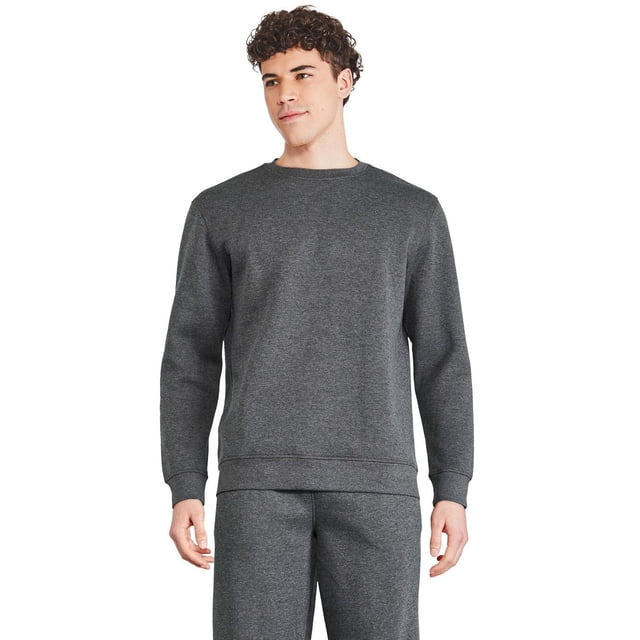 Athletic Works Men's Fleece Popover in dark grey with crew neckline, long sleeves, and ribbed trim at neckline, cuffs, and bottom band, shown front-facing on a male model wearing matching fleece joggers, ideal for activewear or lounging.
