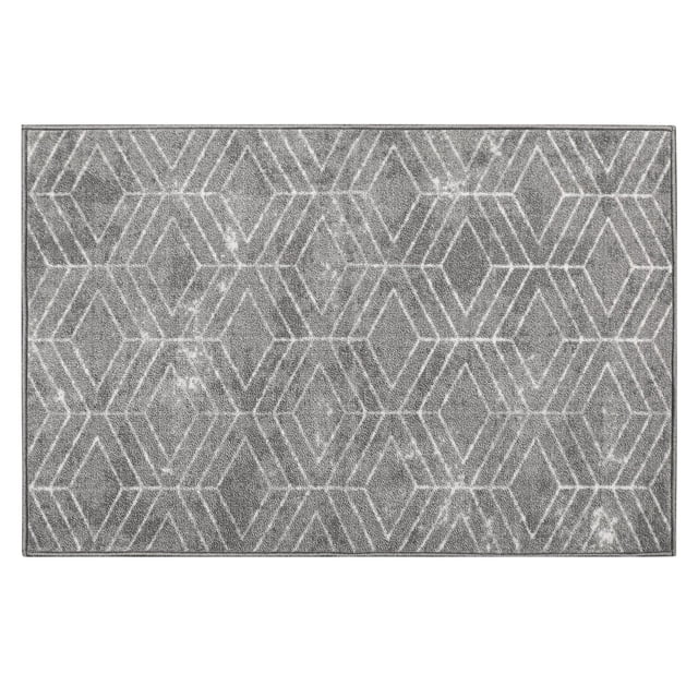 2-ft x 3-ft Malika Grey Printed Floor Mat with a two-tone grey and white geometric diamond pattern, made of durable, colour-fast polyester yarns tufted in level loop pile, backed with latex rubber gel foam to prevent slipping, ideal for indoor doormats in mudrooms or vestibules and easy to clean by vacuuming or gentle machine wash.