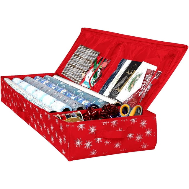 Hold N Storage Christmas Storage Wrapping Paper Organizer and Under Bed Storage Container made from durable 600D material. The red container features a snowflake pattern and is unzipped to reveal neatly organized wrapping paper rolls, ribbons, bows, scissors, and other accessories. Designed to fit up to 27 rolls of 1 3/8-inch diameter and 12 rolls of 2-inch diameter, it includes sturdy handles and zippers for easy transport and under-bed storage.