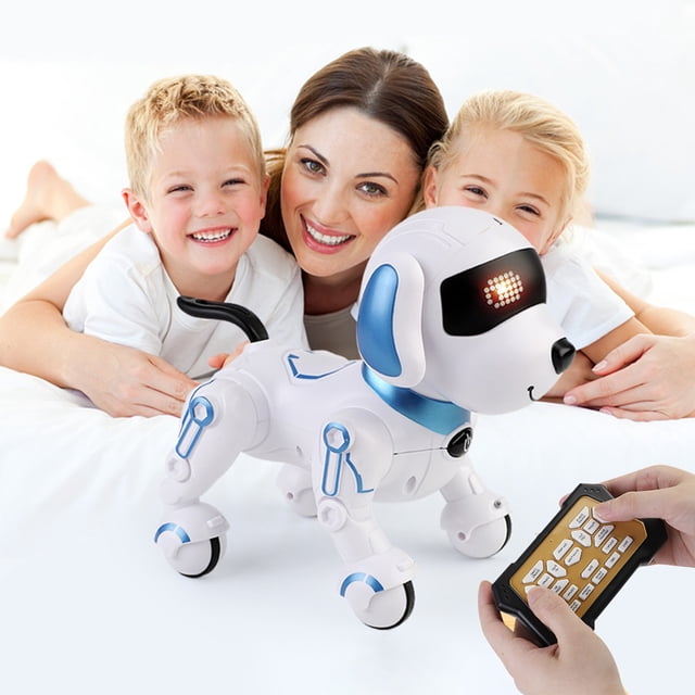 RKSTN Christmas Intelligent Robot RC Robot Dog Toy featuring a white and blue design with wheels for mobility. The programmable smart robot dog is shown in a playful setting, accompanied by a remote control with multiple buttons for various functions. This interactive toy can sing, dance, perform stunts, and respond to commands, making it an engaging gift for kids. Suitable for ages 3 and up, it includes a USB charging cable and rechargeable battery.
