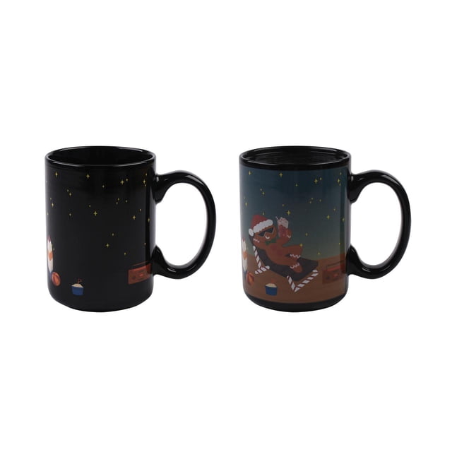Holiday Time 15 oz ceramic heat active change mug in black, revealing a gingerbread man wearing sunglasses and a Santa hat lounging on a beach chair with a drink when hot liquid is added, decorated with stars and holiday elements, suitable for coffee or hot chocolate.