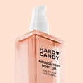 thumbnail image 3 of Hard Candy Nourishing Body Oil, Caramel Cloud, 3 of 6