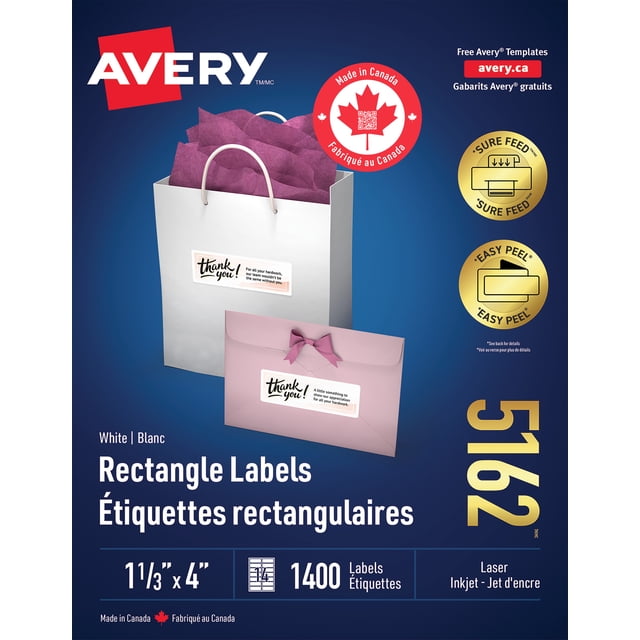 Avery White Rectangle Labels with Easy Peel Sure Feed, 1 ⅓" x 4", shown on a white gift bag and pink envelope with 'thank you!' labels. The pack includes 1400 labels compatible with laser and inkjet printers, made in Canada, featuring Easy Peel and Sure Feed for fast, jam-free printing.