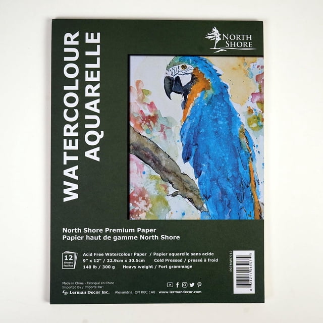 North Shore premier water color pad 9"X12" with a dark green spiral-bound cover featuring a watercolor painting of a blue and orange parrot on a branch, containing 12 sheets of 100% acid-free heavyweight cold press paper ideal for watercolor and gouache techniques.