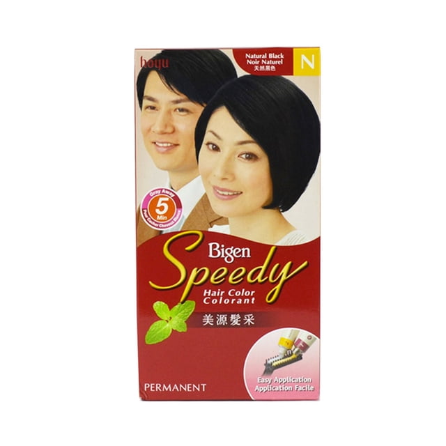 Bigen Speedy Hair Colour box in natural black permanent formula with 5-minute grey coverage and easy comb-through application. Front packaging shows natural black hair illustrations and herb leaf graphics emphasizing fast, simple hair colouring.