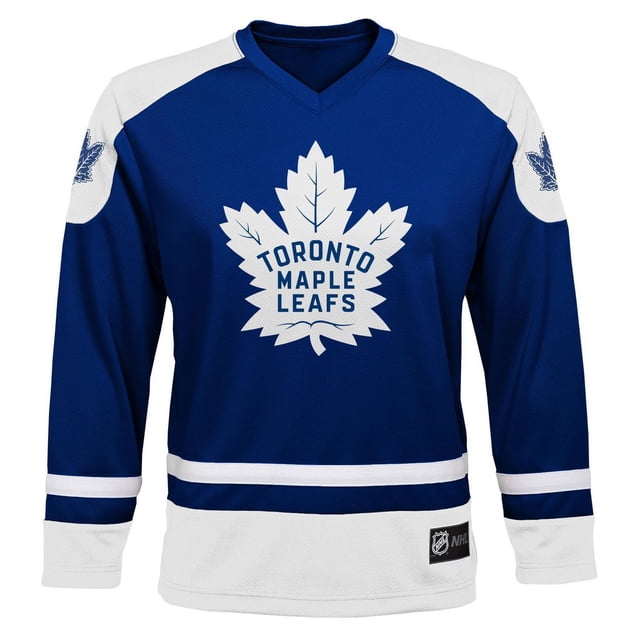 NHL Toronto Maple Leafs Youth Team Jersey in boys' sizes S/M and L/XL, crafted from 100% polyester mesh with a blue body and white shoulders and hem, displaying a large white maple leaf logo with 'Toronto Maple Leafs' text on the front, embroidered sleeve logos, V-neck collar with neck taping, and an official NHL woven jock tag on the lower front. Often used by young fans to show team pride at games or casual outings.