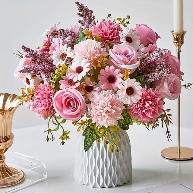 Boovnll Simulation Flower Table Arrangement with multicoloured artificial roses, daisies, and chrysanthemums in a textured white vase. This floral art set features realistic leaves and buds, blending green tones with vibrant pinks and whites. Perfect for home décor, artificial flowers, or living room decoration, it adds elegance and vitality to any space.