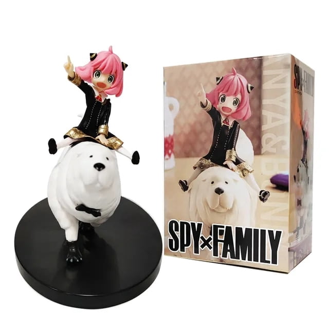 figurine d'Anime Spyxfamily Anya de 14 cm Mettant en Vedette Anya Forger Chevauchant Bond, un Chien Blanc, sur une base Noire. Cette figurine d'Action d'Anime Est Fabriquée en PVC et ABS de Haute Qualité, Comprend des options d'Emballage Détaillées, et Est Idéale pour les collections de Figurines et les fans de la Série.
