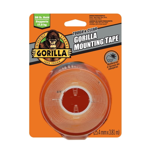 Mounting Tape Tough & Clear by Gorilla in bright orange packaging with a clear double-sided tape roll measuring 25.4 mm by 3.81 m, weatherproof and holding up to 38 pounds (17.2 kg) for permanent indoor and outdoor mounting on smooth and rough surfaces.