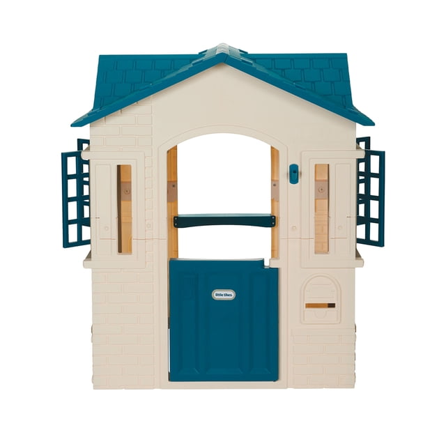 Little Tikes Cape Cottage Playhouse - Blue, front-facing cream playhouse with a blue roof, featuring a working half-door with logo, two open windows with shutters, a mail slot, and brick pattern, ideal for indoor and outdoor imaginative play and skill development.